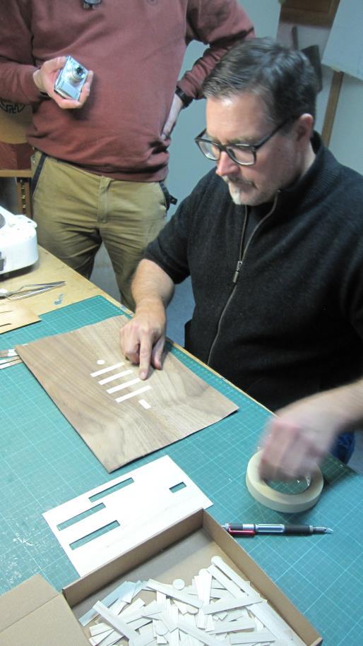 enthusiastic to share his work and his passion for marquetry; he showed us some work to do in veneering.