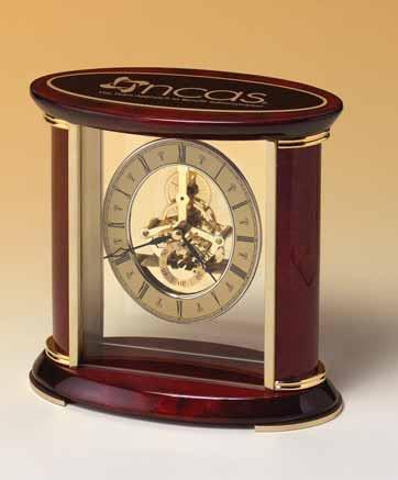 Traditional clock with polished brass and cherry wood finished accents Rosewood and black piano-finish table clock