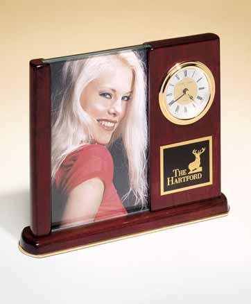 Airflyte Clock Collection Arched brushed aluminum clock with three-hand movement, will hold