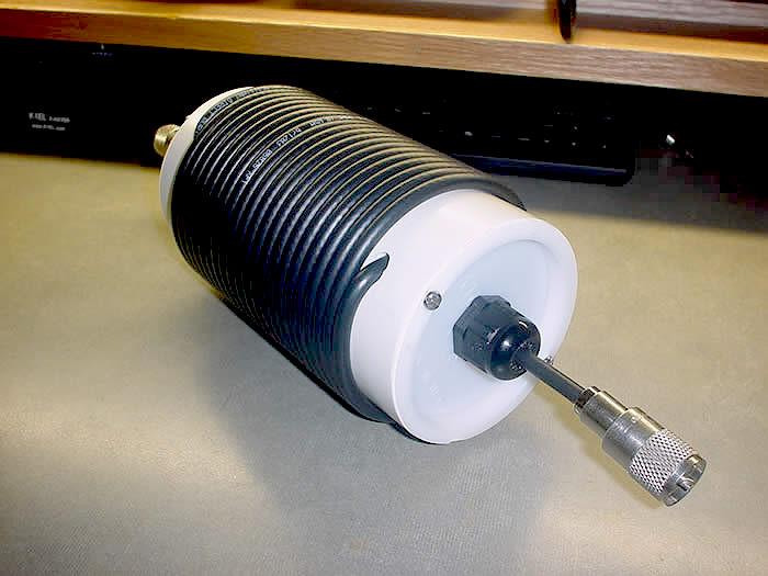 h) For ground mounted quarter-wave verticals, the best device for this application is a 1:1 ratio current choke. SLIDE 26 This is a classic "Ugly balun" or air core solenoid balun.