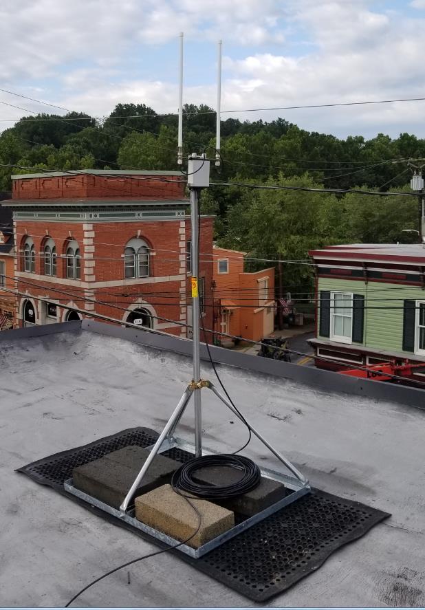 The photo below shows the FMST mounted on a non-penetrating roof mount (EZ-NP-60-200 from Solid Signal $90). This type of mount is ideal for roof-mounting the FMST on a rubberized or sealed roof.