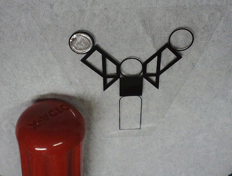 Fig. 14 14. Cut one of the HUD assemblies as shown in Fig. 14. Note: The kit includes 2 HUD frame assemblies (2 printed frames and 2 aluminum reflectors).