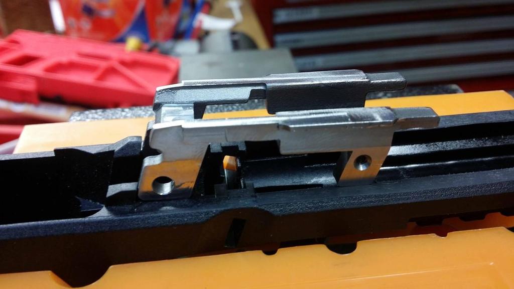 Push the locking block into place. It is supposed to be a tight fit. Install the top pin first, then the slide release and the bottom trigger pin, then the screws. 2.