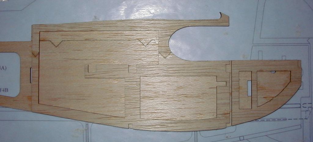 Sand a bevel into one side of the rudder and into the matching side of the two vertical stabilizer pieces as shown on the drawing.