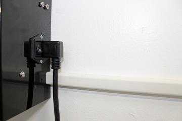 Plug in one side of your power cable into the right side of the Master