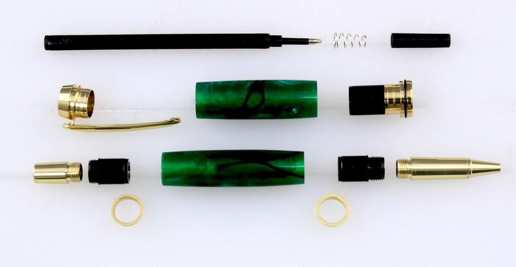Assembly of the Finished Pen: Roller Ball Ink Refill Spring Not Used Upper or Cap Tube Center Band Cap Clip Lower Cap Lower or Body Tube Tip Trim Ring Trim Ring Now that you have turned and finished