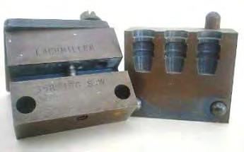 method of having a stop-pin mounted in the mould blocks. The sprue plate was also stamped with "HERTER'S INC. WAS