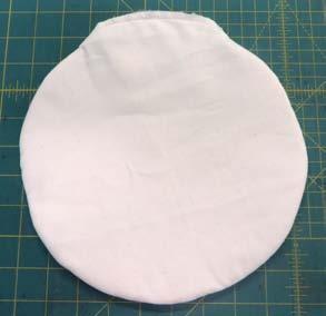 10" circles of muslin. Right sides together, stitch, leaving an opening.