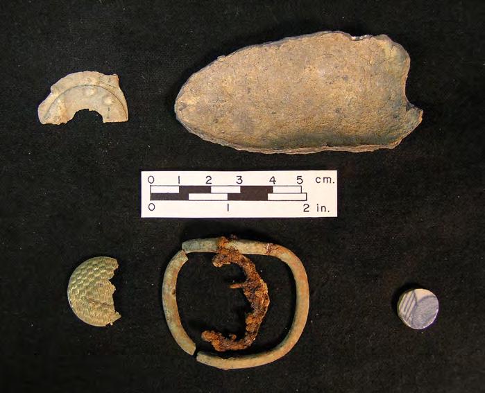 Thwings Point 2014 20 examples. Figure 22 shows four personal items and one piece possibly associated with trade. The trade item is artifact #2489, a possible piece of a lead cloth seal.