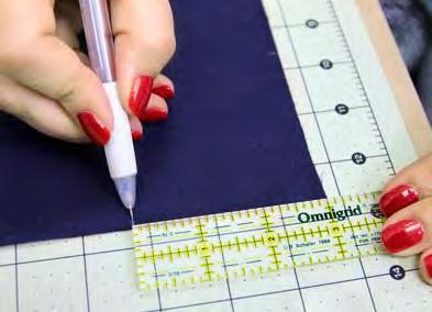 step one Cut from main fabric Two 12ʺ squares Four 2½ʺ x 3½ʺ strips for