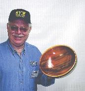 Challenge continued from page 3. Show and Tell Dick Pickering turned a red alder bowl, with tung oil finish.
