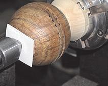 After these grooves are cut on the inside, he re-glues the two sides together with the grain matched and cuts off the tenons.