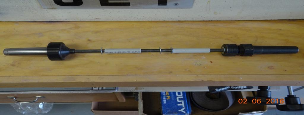 Pen jig with the mandrel saver tail stock center end support, nylon spacers made from a 3/8 water faucet