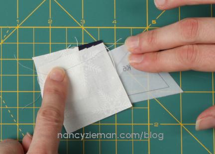 Flip over so that paper is facing printed-side-up, holding everything in place, and stitch (don t forget to add 2 3