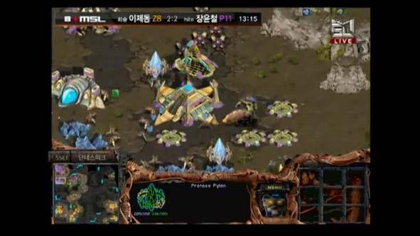 Jaedong spots the expansion with a small zergling force, but is unable to kill it with all of Snow's army