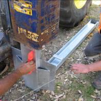 Use the Ground Strut as a template to place the soil anchor weldment in the correct position.