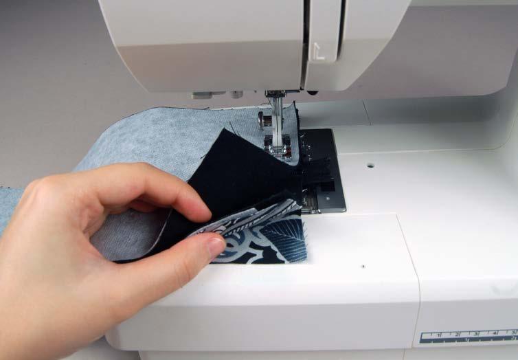 tip: In step 10 you ll be sewing around a lot of curves, so you ll want to clip your bag sides about ½ in along the raw edges, this allows your piece to stretch and curve more easily around the bag
