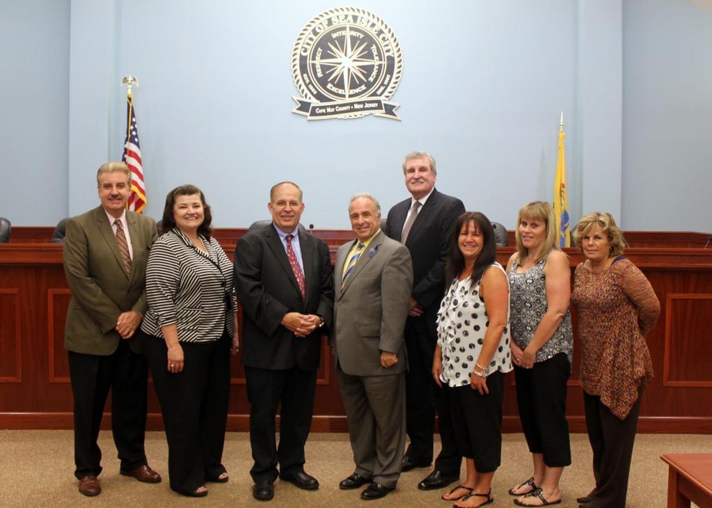 On September 30, Judge Julio Mendez, the Assignment Judge for Atlantic & Cape May Counties (third from left), toured Sea Isle s new Municipal Court Room and offices.