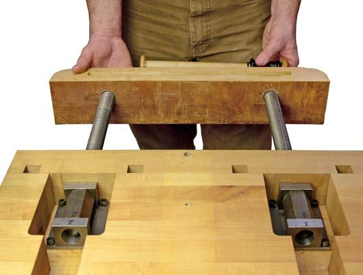 Remove the large vise clamp and retract your vise jaw assembly until the vise screws are just inside the bench top as seen in image 5B.