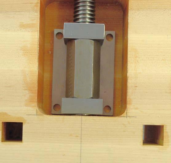 Stop periodically and check the measurements from the inside edge of your vise jaw assembly to the outside edge of your bench top to ensure the Chain Drive Vise is threading evenly into the standoffs.