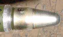 Photos top and bottom show marking detail of the Bulgarian PG-15V 73MM cartridge.