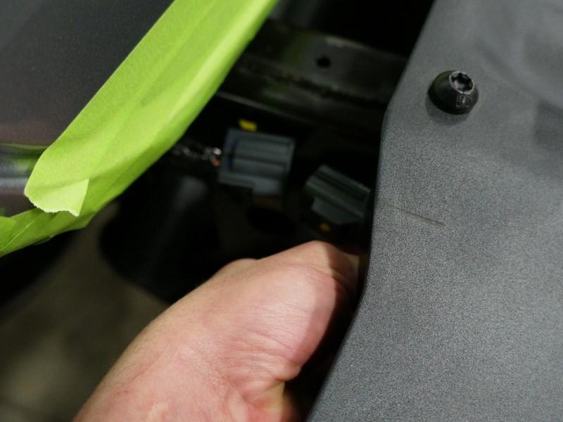 Use a small flat head screwdriver to remove the pins by placing the driver under the head of the