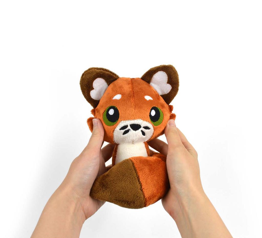 2 Decorate your desk or nightstand with this palm-sized fox! It's extra-large tail is especially charming as it wraps around the tiny fox body and helps it balance upright.