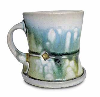 24 Tim Sherman s blue ash mug, 3½ in.