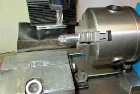 The Valve Rod is connected to the Eccentric Rod with a small link. The link is made up of a fork like part with a pin and a rod that fits in between the fork.