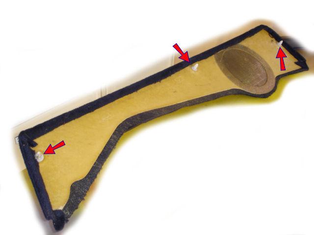 Figure 3 5. Unclip the leather covered section C by prising it gently loose from the door.