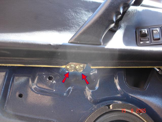 Figure 5 7. Remove the door catch release. This is retained by a Philips head bolt.