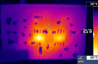 PCB photograph of the realized oscillator and thermal image of the oscillator after 48 hours of operation (b) Table.
