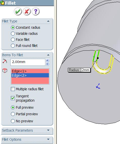 In the Chamfer Feature Manager set the parameters as shown and select the top edge of the extruded cut in the graphics area.