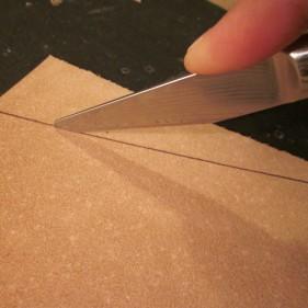 CUT LEATHER Layout your leather grain side up on your work surface,