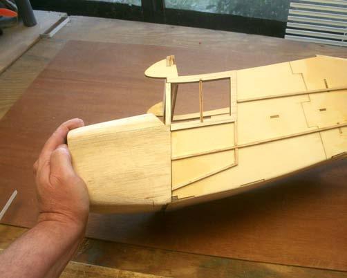 balsa to make the door framework and glue it to the fuselage sides as show.