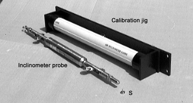 Figure 14 shows the inclinometer probe being readied for calibration check.