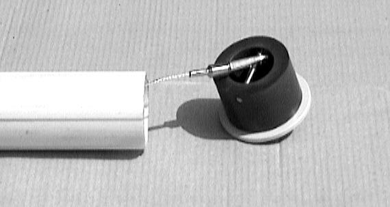 Figure 10 The other end of the pull cable is provided with a hook with a safety latch. The hook should be kept engaged to the pin in the casing end cap as shown in figure 10 when not in use.