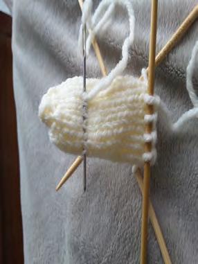 weave yarn down to neck and knot in place then weave around the neck, tighten, knot, then weave yarn and cut Arm: make two Cast on 6 leaving a long tail to create wrist