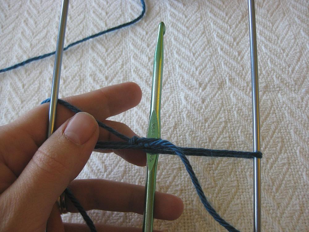 5. Next, flip the crochet hook to the back of the work (the hook will
