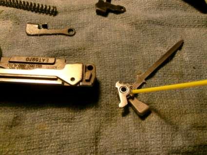 Assemble the hammer assembly as shown and apply a tiny