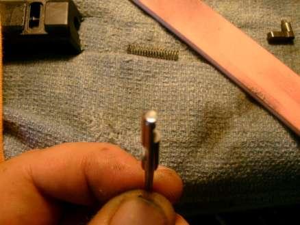Careful not to change anything I polish the firing pin with compound and the cloth