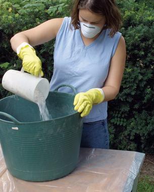 plastic drop cloth plastic container for a mold wire brush THE RECIPE 1 part Portland cement 1 1/2 parts sphagnum peat moss 1 1/2 parts perlite To add strength, I add a small handful of fibermesh, a