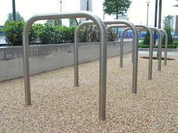 Hendon, London Steel & Stainless Steel Cycle Stands COLLEGE Bolt Down galvanised steel shown at West Middlesex University Hospital, Isleworth COLLEGE Root Fixed black plastic coated installed