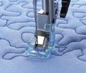 Quilting 2.1 21 Make sure the IDT system is disengaged. Snap on the Sensormatic free-motion foot 6A. 22 Select a straight stitch. Thread with sewing thread top and bobbin.