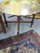 288 An unusual, heavy, solid brass table with