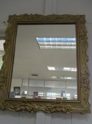 304 An ornate gold painted framed