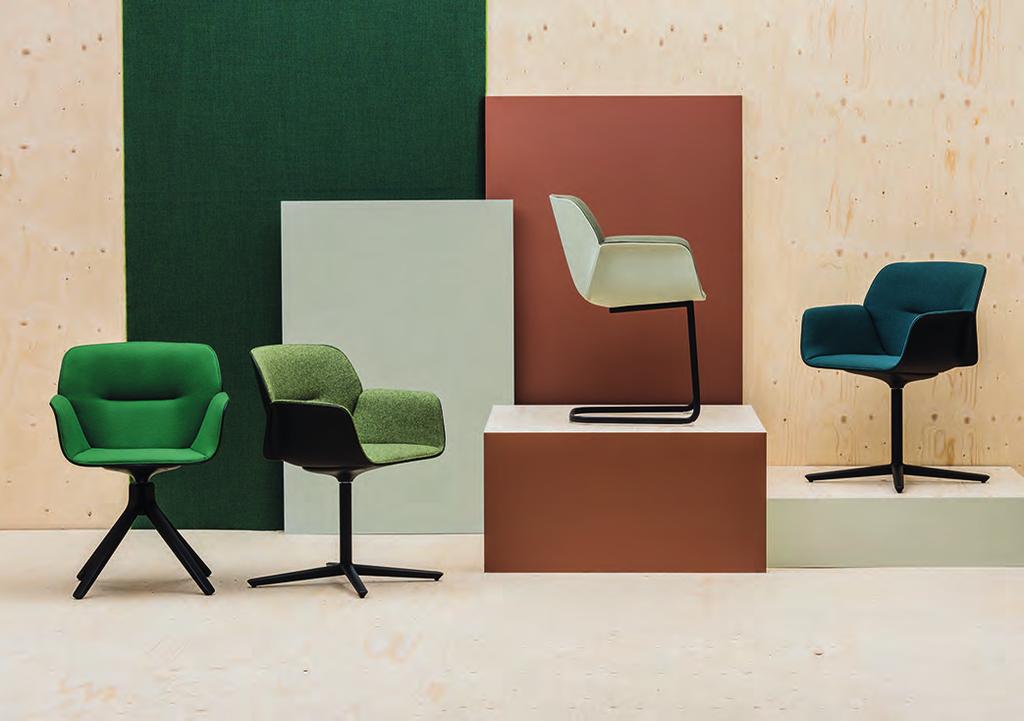 Nuez Andreu World Armchair with thermoplastic shell available in several colors.