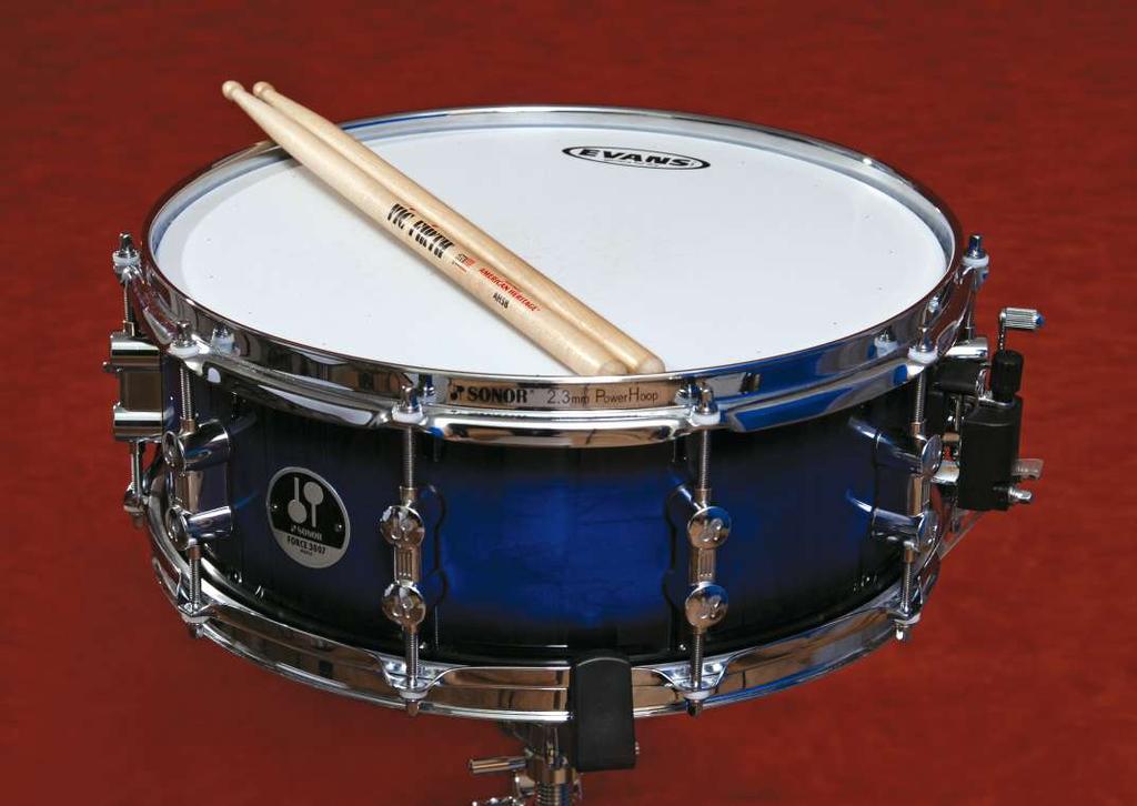 A. The Snare drum has two heads. One on the top and one on the bottom. The bottom part has the authentic snare attached to it.