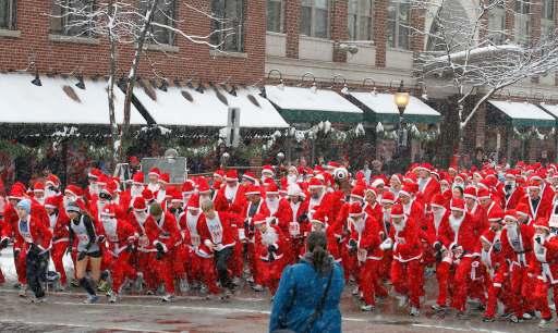 Image by Jerry Hug Sprinting Santas Over one thousand dressed up Santas ran through Arlington Heights recently.
