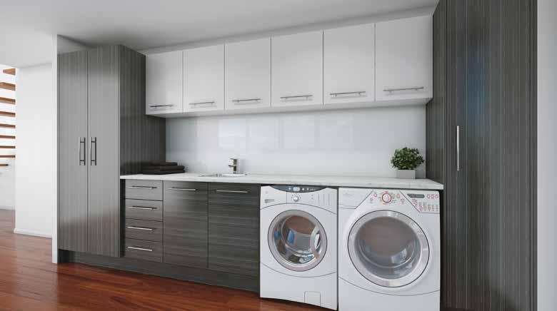 Sleek and modern, this custom wall to wall laundry has all your storage covered with a vast array of cabinets for all your laundry requirements.